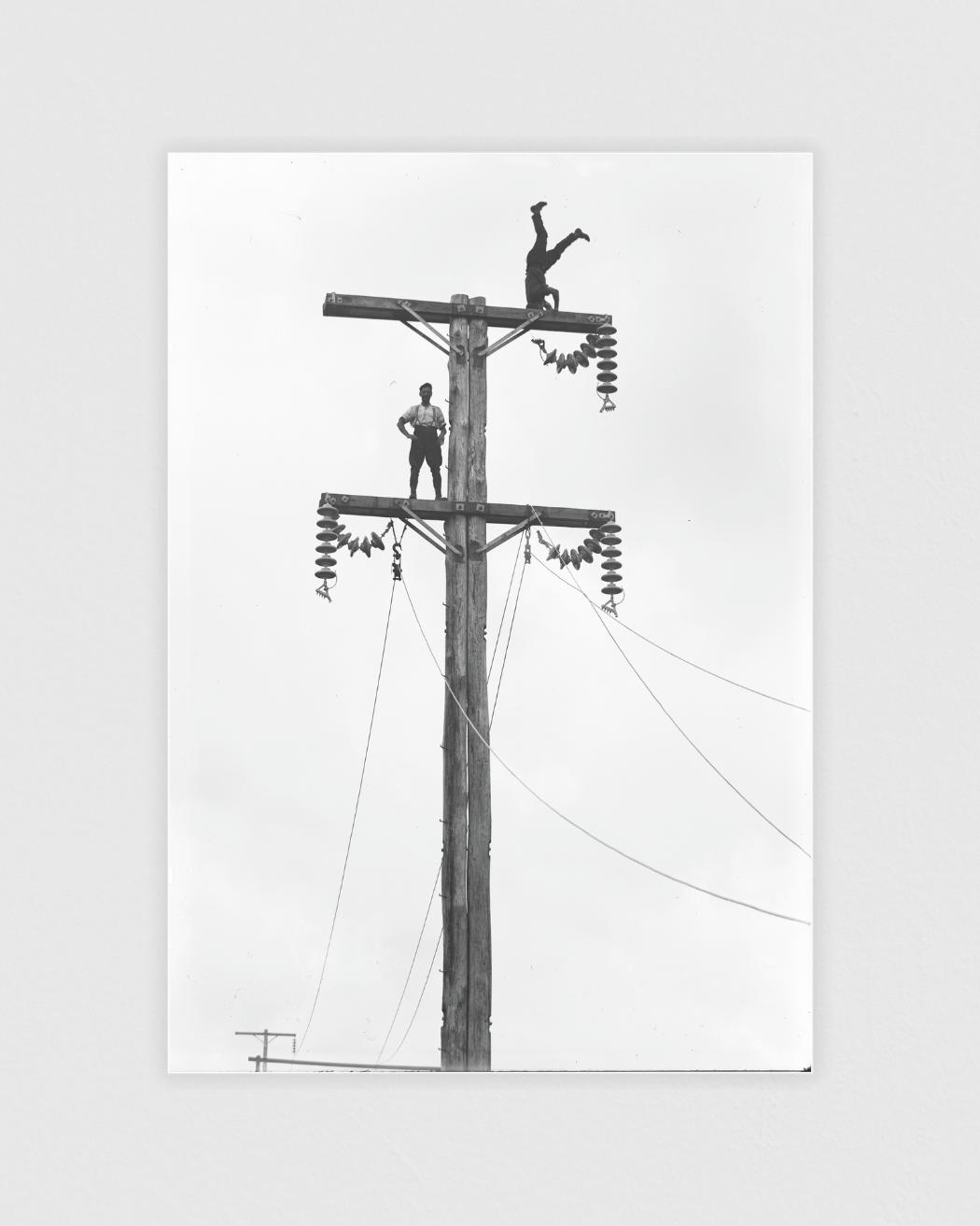 Bild på C. Cusack and mate on a Queen St, Levin transmission pole