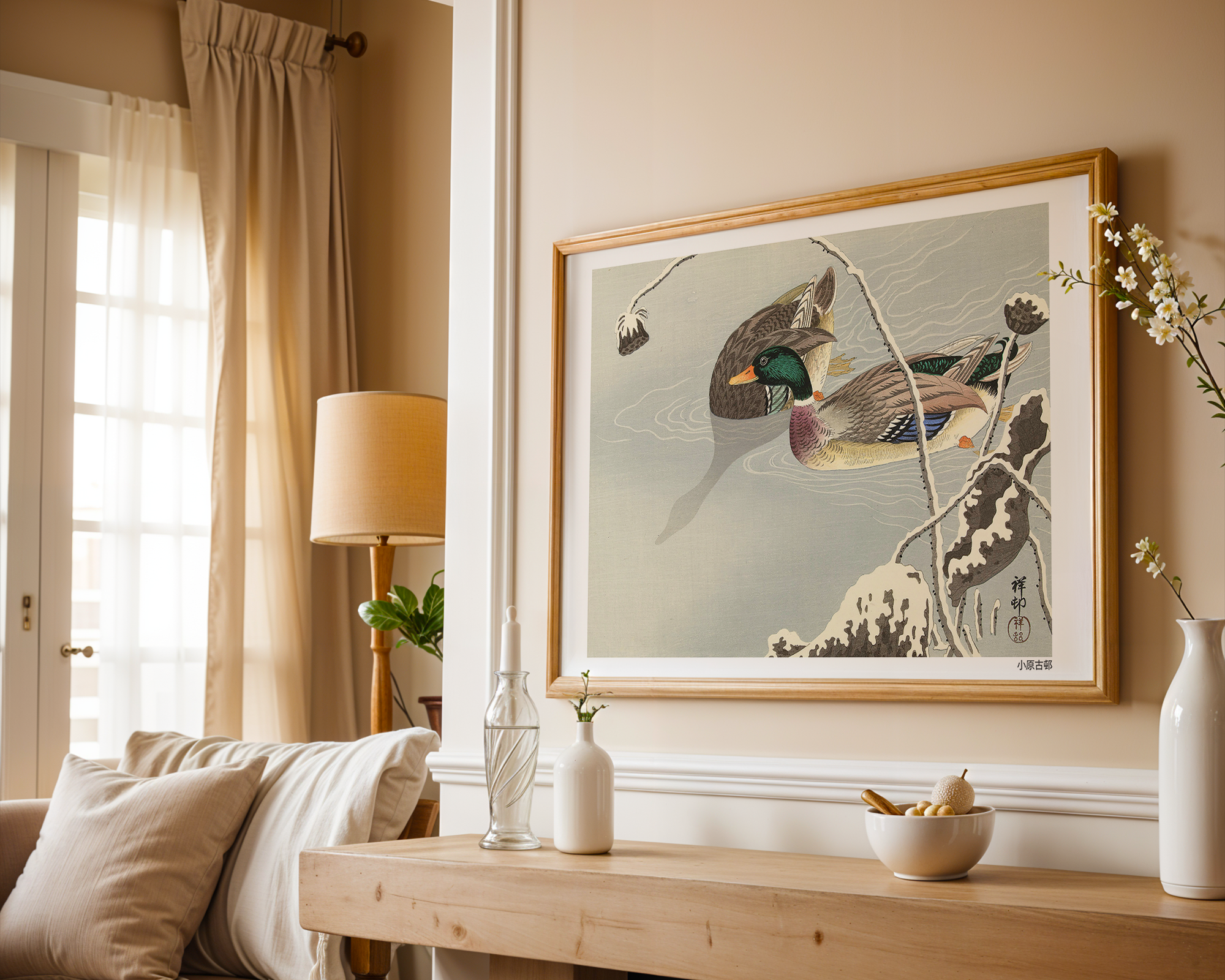 Bild på Two Mallards near a Snow Covered Lotus